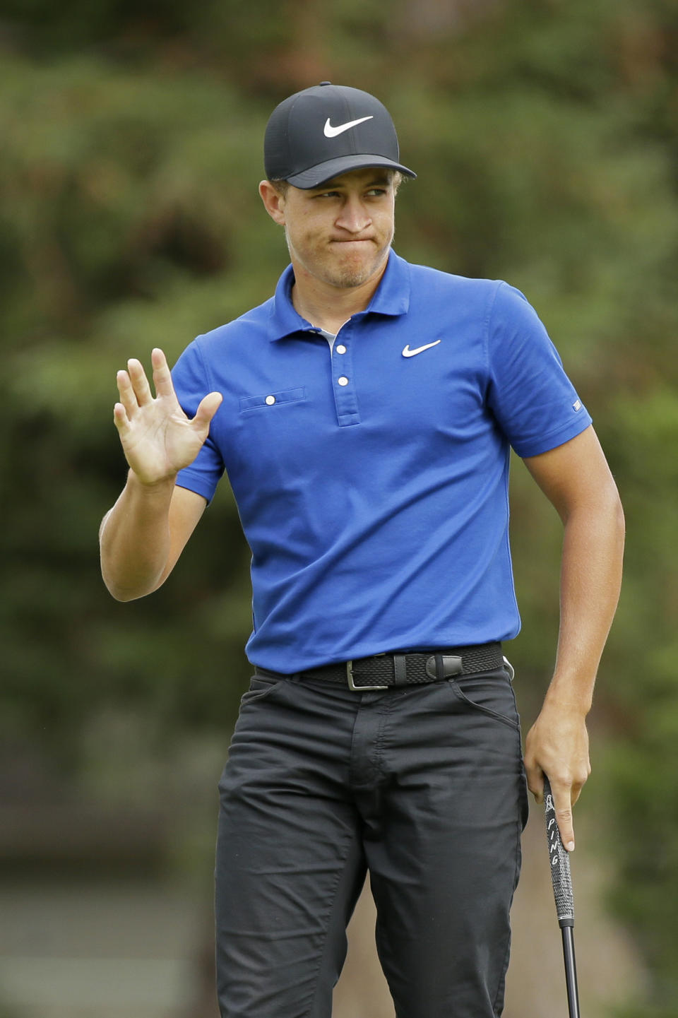 Cameron Champ waves after making a birdie putt on the sixth green of the Silverado Resort North Course during the final round of the Safeway Open PGA golf tournament Sunday, Sept. 29, 2019, in Napa, Calif. (AP Photo/Eric Risberg)