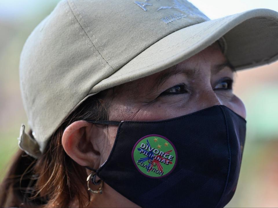 File: A pro-divorce protester takes part in a demonstration outside the Senate building in Pasay, Metro Manila, last year (AFP via Getty Images)