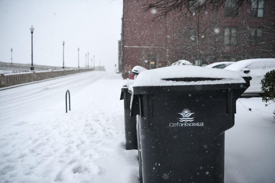 Snow piles onto West Jackson Avenue on Monday.