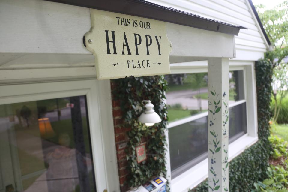 Dave and Joyce Jones have filled their yard with multiple signs and decorating items to create a welcoming atmosphere for their guests.