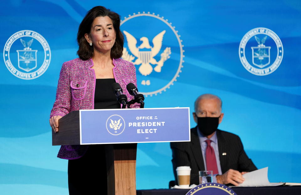 Governor Gina Raimondo, U.S. President-elect Joe Biden's nominee to be secretary of Commerce, speaks as listens while announcing members of his economics and jobs team at his transition headquarters in Wilmington, Delaware, U.S., January 8, 2021. REUTERS/Kevin Lamarque