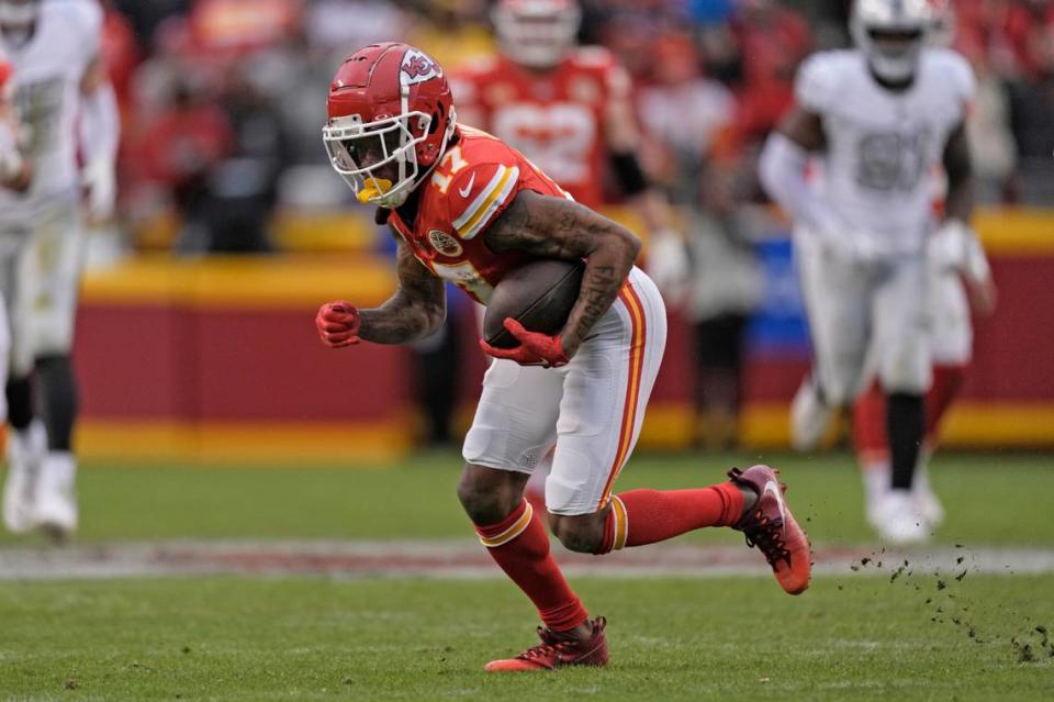 Kansas City Chiefs wide receiver Richie James runs the ball during the second half of an NFL football game against the Las Vegas Raiders Monday, Dec. 25, 2023, in Kansas City, Mo. (AP Photo/Charlie Riedel)