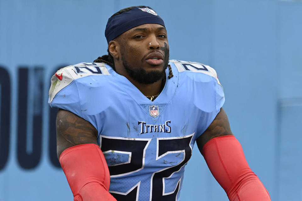 FILE - Tennessee Titans running back Derrick Henry walks on the sidelines before the second half of an NFL football game against the Cincinnati Bengals on Sunday, Nov. 27, 2022, in Nashville, Tenn. The two-time NFL rushing champ absolutely believes his position coach Tony Dews would make a great head coach in the NFL. (AP Photo/Mark Zaleski, File)