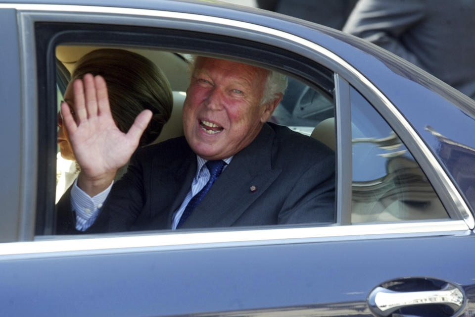 Prince Vittorio Emanuele of Savoy waves from a car as he arrives at the Quirinale Presidential Palace to meet with Italian President Carlo Alberto Ciampi, in Rome, May 16, 2003. Prince Vittorio Emanuele, son of Italy’s last king, Umberto II, has died. He was 86. The Savoy Royal House said in a statement that he died on Saturday, Feb. 3, 2024, in Geneva, Switzerland. Vittorio Emanuele was obliged to leave Italy for exile when he was only 9, after Italians voted to abolish the monarchy in 1946. (Mauro Scrobogna/LaPresse via AP)