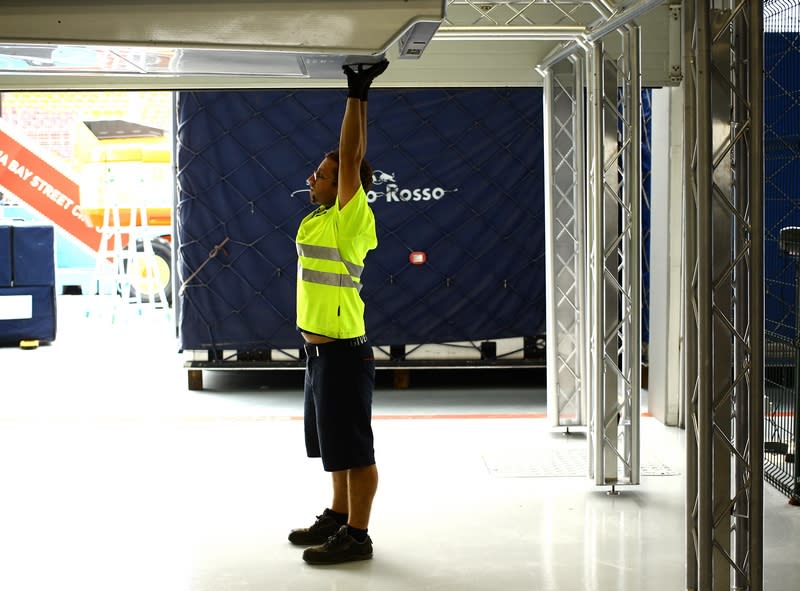 It takes 2.5 days and about 12 people to complete the logistics of setting up the garage. (Courtesy of Scuderia Toro Rosso)