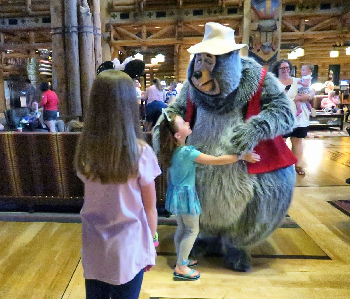 Disney character Big Al entertains children during Hurricane Ian shut in  (Orlando Sentinel)