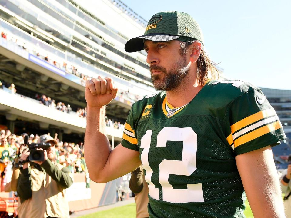 Aaron Rodgers walks off the field after a win over the Chicago Bears.
