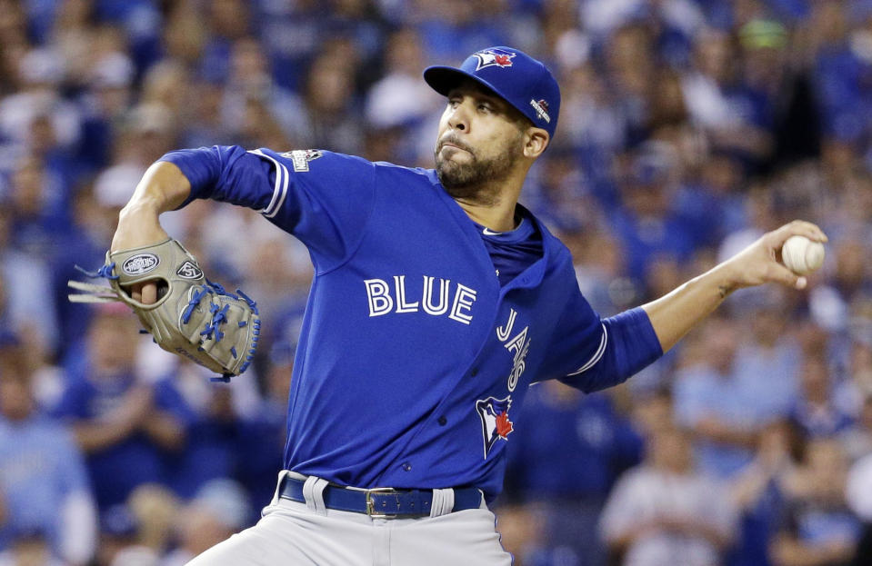 Toronto Blue Jays starting pitcher David Price throws against the Kansas City Royals during the first inning in Game 6 of baseball's American League Championship Series on Friday, Oct. 23, 2015, in Kansas City, Mo. (AP Photo/Charlie Riedel)