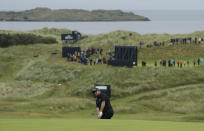 Ireland's Shane Lowry chips onto the 16th green during the second round of the British Open Golf Championships at Royal Portrush in Northern Ireland, Friday, July 19, 2019.(AP Photo/Matt Dunham)