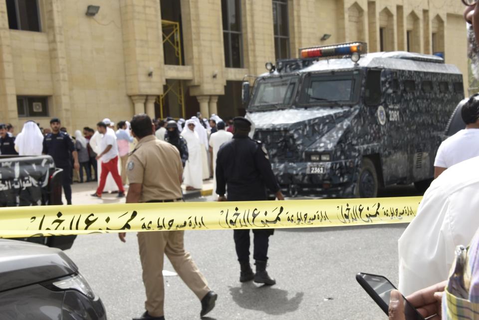 Police cordon off the Imam Sadiq Mosque after a bomb explosion following Friday prayers, in the Al Sawaber area of Kuwait City