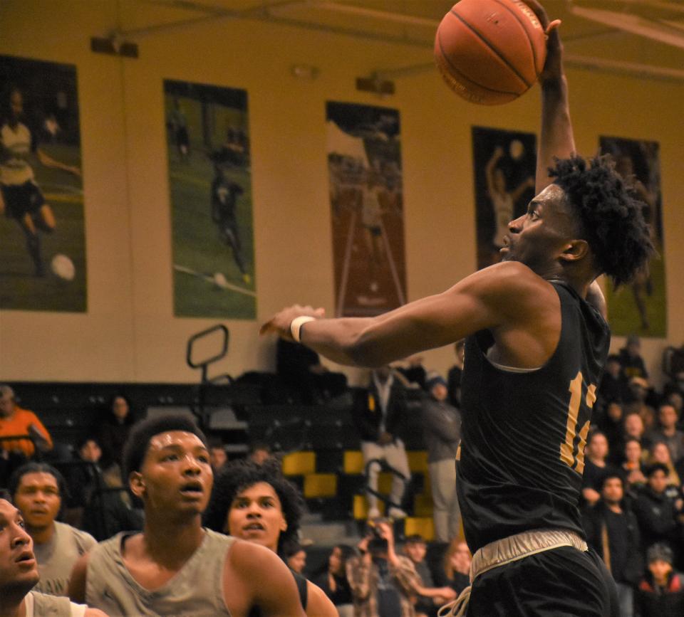 Herkimer College General Shaheed Alcide goes up for his shot against Mohawk Valley Community College Tuesday, Nov. 29, 2022, in Herkimer, New York.