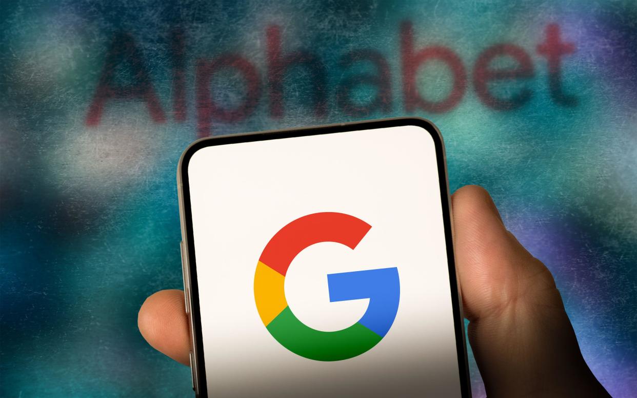 Alphabet and Google logo displayed on a smartphone