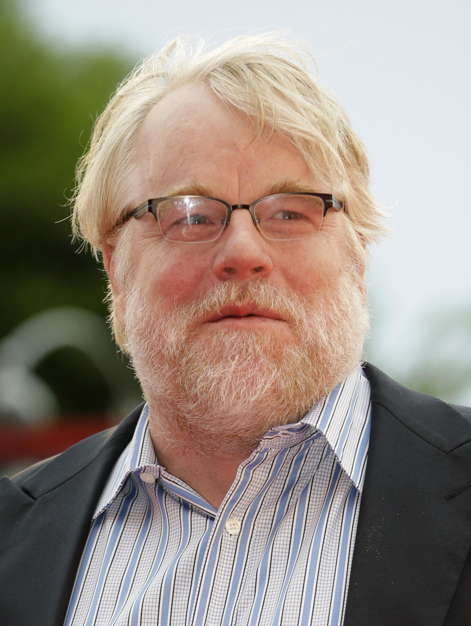 FILE - In this Sept. 1, 2012 file photo, actor Philip Seymour Hoffman arrives for the premiere of 'The Master' at the 69th edition of the Venice Film Festival in Venice, Italy. The death of actor Philip Seymour Hoffman has once again drawn attention to a New York City heroin trade so sophisticated that getting the drug delivered to your door is nearly as easy as ordering a pizza. (AP Photo/Andrew Medichini, File)