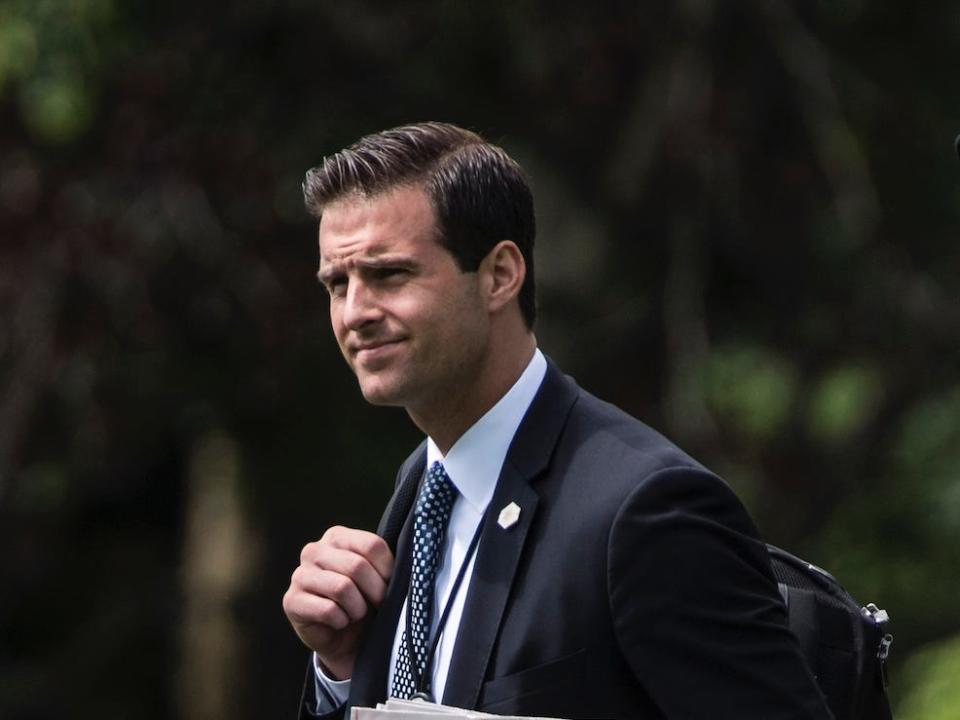 White House aide John McEntee follows President Donald Trump to board the Marine One helicopter from the South Lawn of the White House in Washington, DC on Wednesday, June 07, 2017.