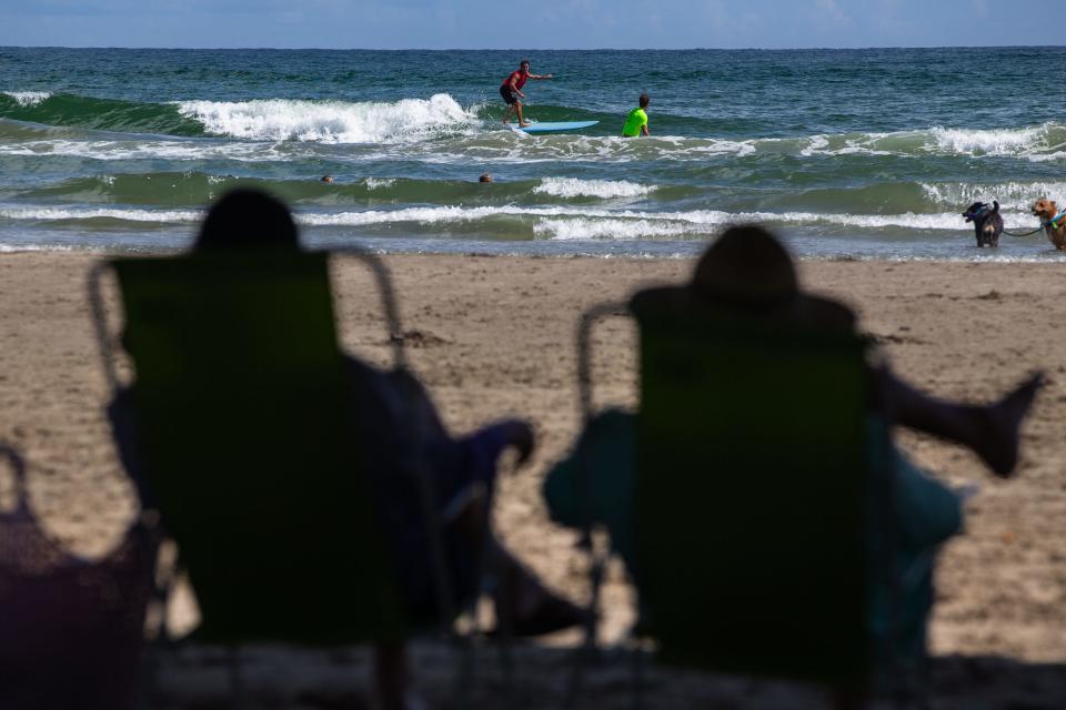 Surfers compete in the 2022 Port A Surf Fest in Port Aransas, Texas on Saturday, Sep. 24, 2022.