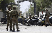 Resolute Support (RS) forces arrive at the site of a car bomb explosion in Kabul, Afghanistan, Thursday, Sept. 5, 2019. A car bomb rocked the Afghan capital on Thursday and smoke rose from a part of eastern Kabul near a neighborhood housing the U.S. Embassy, the NATO Resolute Support mission and other diplomatic missions. (AP Photo/Rahmat Gul)