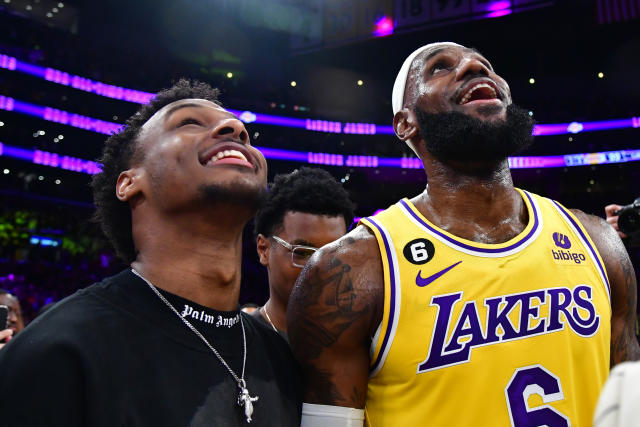 Feb 7, 2023; Los Angeles, California, USA; Los Angeles Lakers forward LeBron James (6) celebrates with his son Bronny James after breaking the all-time scoring record in the third quarter against the <a class="link " href="https://sports.yahoo.com/nba/teams/oklahoma-city/" data-i13n="sec:content-canvas;subsec:anchor_text;elm:context_link" data-ylk="slk:Oklahoma City Thunder;sec:content-canvas;subsec:anchor_text;elm:context_link;itc:0">Oklahoma City Thunder</a> at Crypto.com Arena. Mandatory Credit: Gary A. Vasquez-USA TODAY Sports