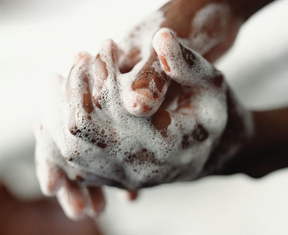 <p>According to the <a href="https://www.cdc.gov/handwashing/index.html" rel="nofollow noopener" target="_blank" data-ylk="slk:CDC" class="link ">CDC</a>, hand washing prevents the spread of germs, including COVID-19. “I wash my hands all the time and open doors and touch elevator buttons with a clean tissue whenever possible,” says Dan Collins, who works in media relations at a Baltimore hospital. “When I return to my desk, I immediately grab my supply of antibacterial hand wipes. And whenever my eye itches, I never use the tip of my finger to scratch unless I can sanitize my finger first; instead, I use my knuckle or the back of my hand, as these areas have had less contact with germs than my fingertips.”</p><p>Collins also holds his breath “for a good 15 seconds” if he walks by someone who sneezes, and he takes zinc at the first sign that a cold is trying to take hold (usually a telltale back-of-the-throat tickle)—a habit that <a href="http://www.ncbi.nlm.nih.gov/pubmed/23775705" rel="nofollow noopener" target="_blank" data-ylk="slk:research supports" class="link ">research supports</a>.</p>