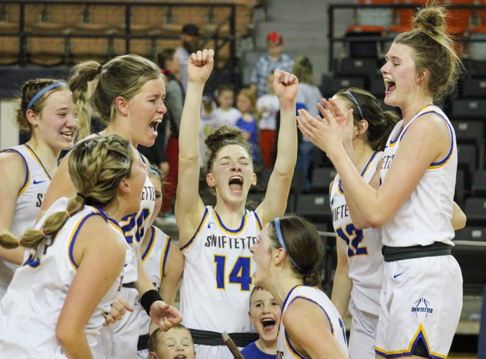 Nazareth celebrates its 26-24 win over Claude in the Region I-1A championship girls basketball game in the Texan Dome at Levelland on Saturday, Feb. 25, 2023.