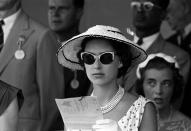 <p>Princess Margaret opts for a stunning hat and sunglasses at the Kingston races during the Royal Tour of the Caribbean 1955.</p>