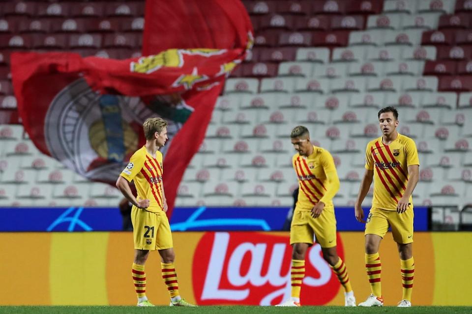 From left: Frankie de Jong , Sergino Dest and Nico Gonzalez react in Lisbon (EPA)