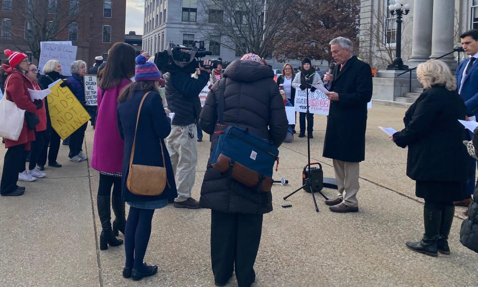 New Hampshire state Rep. David Meuse, D-Portsmouth, speaks in support of gun legislation in front of the New Hampshire State House Wednesday, Jan. 3, 2023.