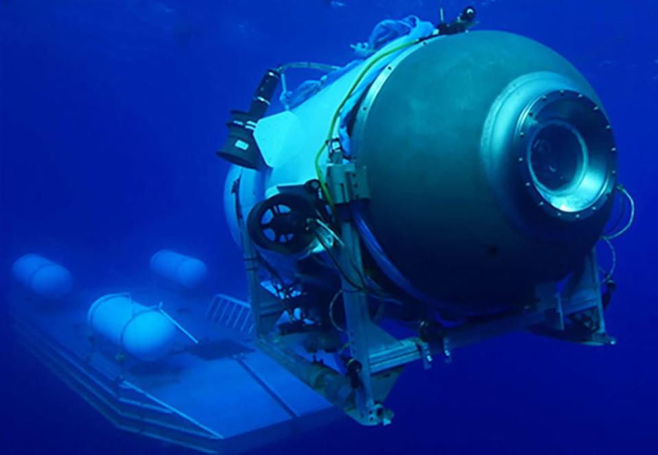 This undated image, courtesy of OceanGate Expeditions, shows their Titan submersible launching from a platform.