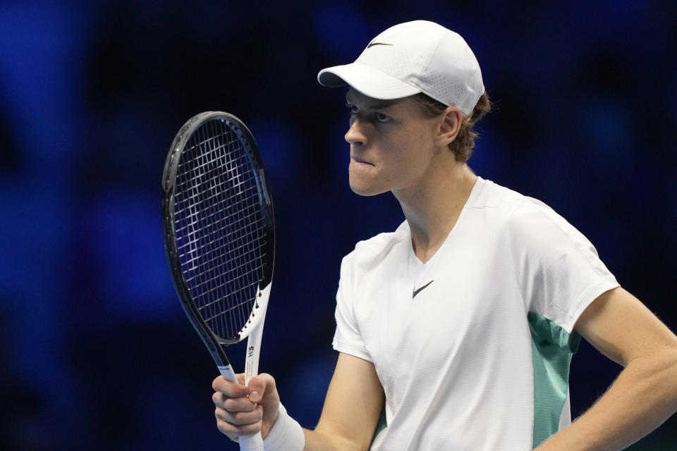 Italy's Jannik Sinner reacts after losing a point to Serbia's Novak Djokovic during their singles final tennis match of the ATP World Tour Finals at the Pala Alpitour, in Turin, Italy, Sunday, Nov. 19, 2023. (AP Photo/Antonio Calanni)