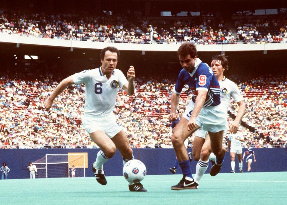 Beckenbauer headed to the US to play for New York Cosmos late in his career (AP)
