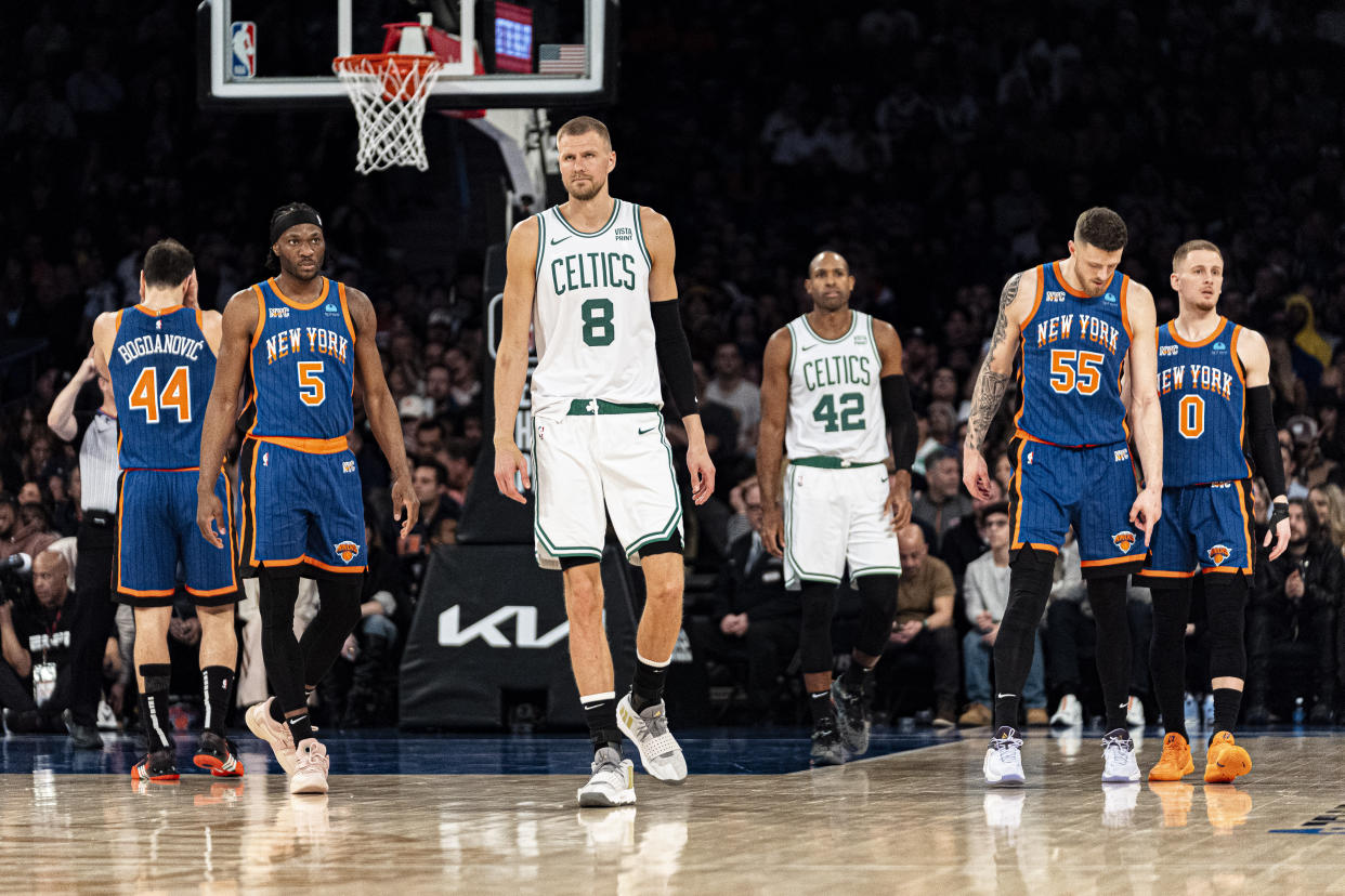 Boston Celtics center Kristaps Porzingis (8) walks on the court during the first half of an NBA basketball game against the New York Knicks in New York, Saturday, Feb. 24, 2024. (AP Photo/Peter K. Afriyie)