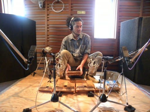 Japanese thumb piano player Sakaki Mango performing in Cape Town in 2010. He was "initially attracted to the religious aspect" of the instrument, Ribalet said, but later focused on developing his own sound as an artist