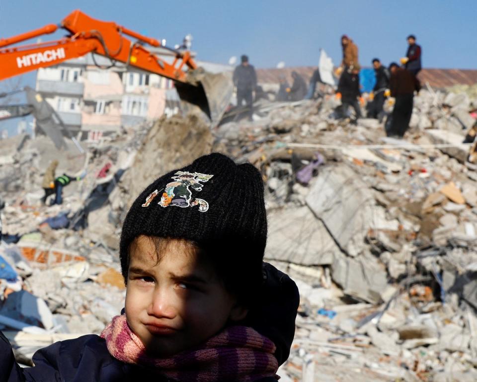 A child looks on in the aftermath of a deadly earthquake in Kahramanmaras, Turkey (REUTERS)