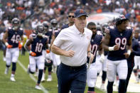 Chicago Bears head coach Matt Eberflus jogs off the field at halftime of an NFL preseason football game between the Bears and the Kansas City Chiefs Saturday, Aug. 13, 2022, in Chicago. (AP Photo/Nam Y. Huh)