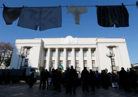 Underwear hung by anti-corruption activists is on display during a rally to demand officials register their income declarations in the e-declaration system in front of the Ukrainian parliament building in Kiev, Ukraine, October 18, 2016. Picture taken October 18, 2016. REUTERS/Valentyn Ogirenko