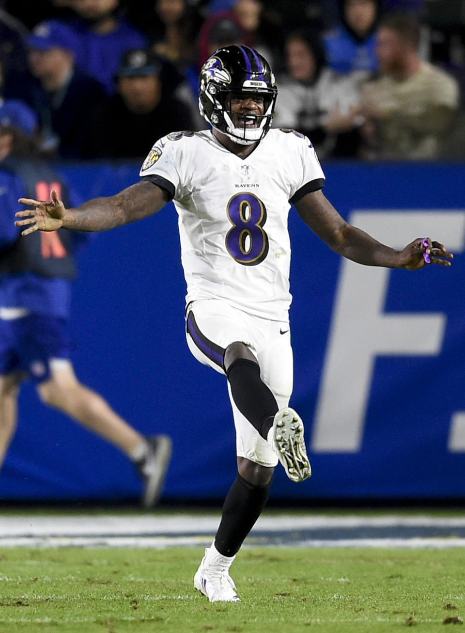 Baltimore Ravens quarterback Lamar Jackson celebrates after a touchdown against the Los Angeles Chargers during the second half in an NFL football game Saturday, Dec. 22, 2018, in Carson, Calif. (AP Photo/Kelvin Kuo)