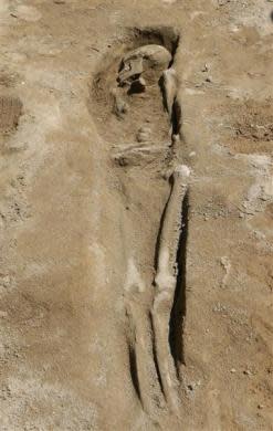 A human skeleton at an excavation site of a graveyard dating back to the Phoenician period, around 600 B.C., is seen in Tyre, southern Lebanon May 15, 2012.