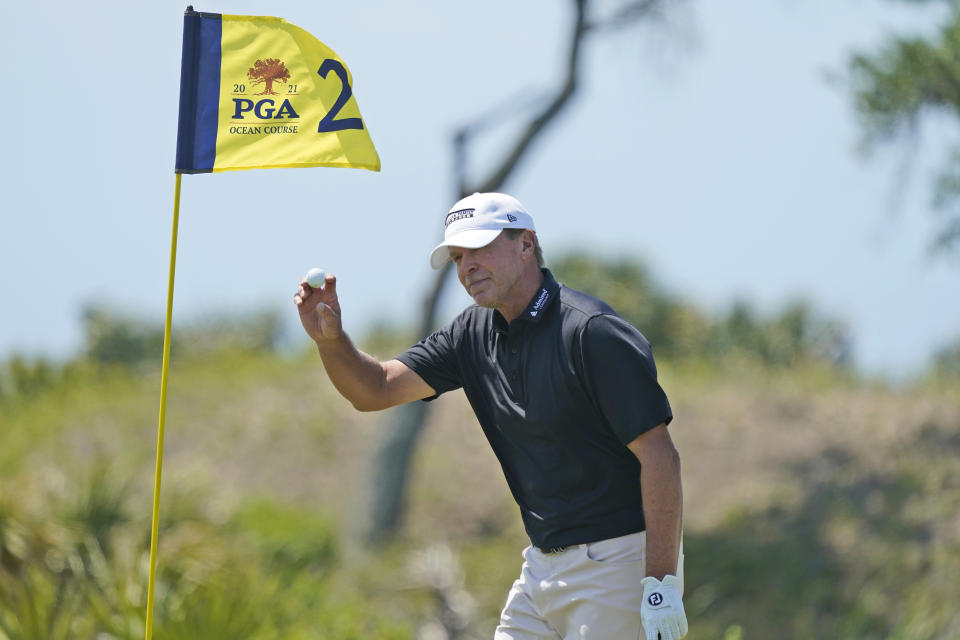 Steve Stricker tips his ball to the crowd after an eagle on the second hole during the second round of the PGA Championship golf tournament on the Ocean Course Friday, May 21, 2021, in Kiawah Island, S.C. (AP Photo/Matt York)