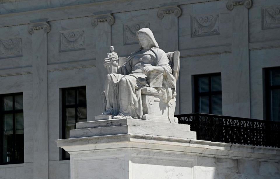 PHOTO: The Contemplation of Justice statue stands in front of the US Supreme Court in Washington, DC, on April 21, 2023.  (Olivier Douliery/AFP via Getty Images)