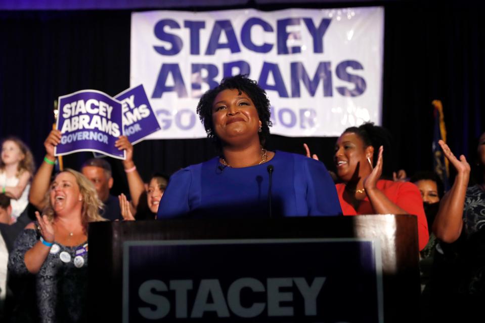 Georgia Democratic gubernatorial candidate Stacey Abrams smiles before speaking to supporters during an election-night watch party, Tuesday, May 22, 2018, in Atlanta.