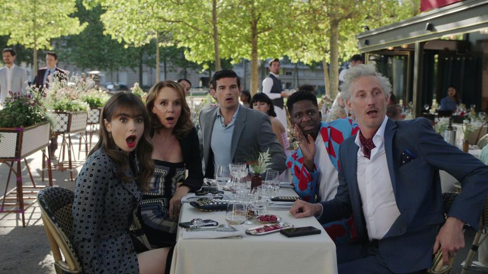 emily in paris l to r lily collins as emily, philippine leroy beaulieu as sylvie grateau, paul forman as nicolas de leon, samuel arnold as julien, bruno gouery as luc in episode 307 of emily in paris cr courtesy of netflix © 2022