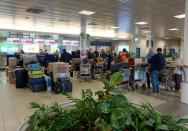 A luggage stack is seen near check-in before flight to Moscow in Prague international airport