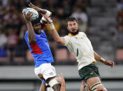 Namibia's Tjiuee Uanivi, left, and South Africa's Lood de Jager compete for lineout ball during the Rugby World Cup Pool B game at the City of Toyota Stadium between South Africa and Namibia in Toyota City, Japan, Saturday, Sept. 28, 2019. (AP Photo/Christophe Ena)