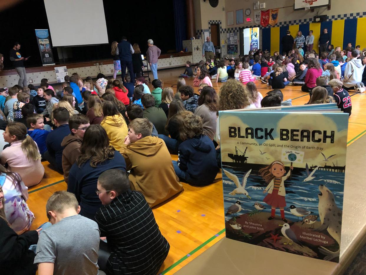 The Gorham Elementary School gym was packed with students waiting to hear from the authors of "Black Beach."