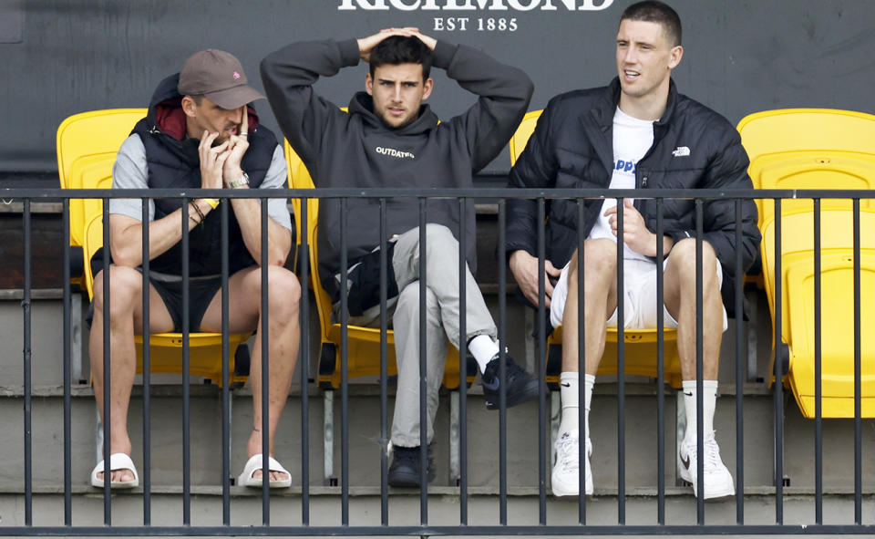 Scott Pendlebury, Nick Daicos and Darcy Cameron.