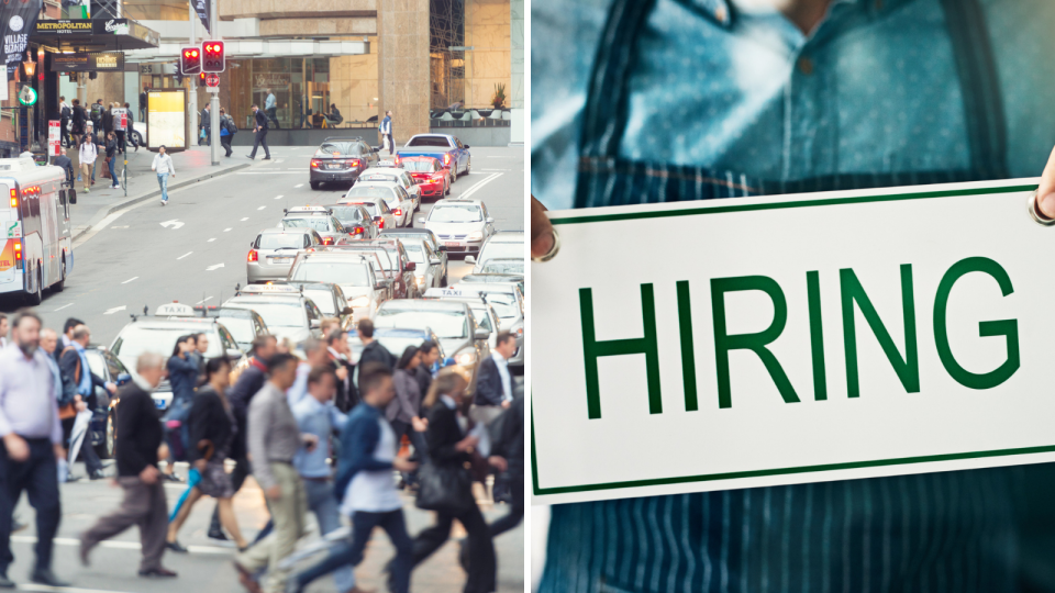 Pedestrians cross busy road in Sydney CBD. Close up of worker wearing apron holding 'hiring' sign.