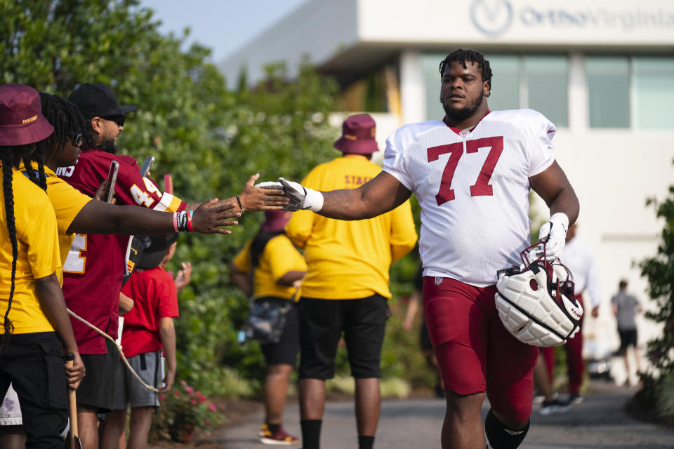 Washington Commanders offensive tackle Saahdiq Charles (77). (AP Photo/Evan Vucci)