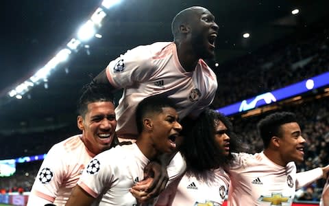 United celebrate against PSG - Credit: Getty Images