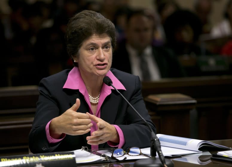 California State Auditor Elaine Howle discusses the audit her office did on the California State University system during a joint legislative hearing , Wednesday, Aug. 23, 2017, in Sacramento, Calif. State lawmakers expressed disappointment that CSU campuses couldn't fully justify spending on management staff as legislators grapple with ways to make college more affordable. (AP Photo/Rich Pedroncelli)