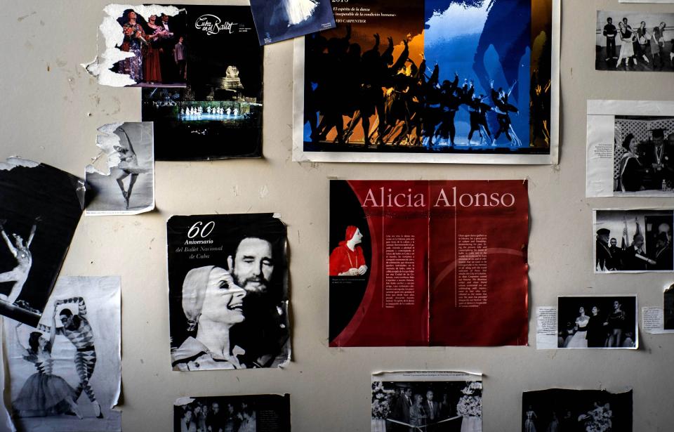 Several images of the late ballerina, choreographer and director of Cub'a National Ballet, Alicia Alonso hang on a blackboard at the National Ballet School in Havana Havana, Cuba, Thursday, Dec. 12, 2019. Viengsay Valdes, the new head of Cuba's legendary National Ballet, says she hopes to renew the institution after the death of long-time director Alicia Alonso by introducing new choreography and appearances by dancers who have emigrated to other companies. (AP Photo/Ramon Espinosa)