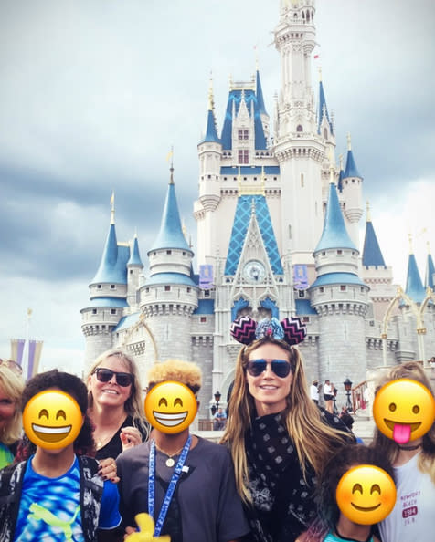 <p>The model whisked her foursome — Helene, Lou, Johan, and Henry — to Walt Disney World for <a rel="nofollow noopener" href="https://www.instagram.com/p/BVfiOCNgKOL/?taken-by=heidiklum" target="_blank" data-ylk="slk:a few days;elm:context_link;itc:0;sec:content-canvas" class="link ">a few days</a> in June. She obscured her kids’s faces with smiling emojis in the snapshot she shared from the trip, but the truth is that their actual faces probably didn’t look much different! (Photo: Heidi Klum via Instagram) </p>